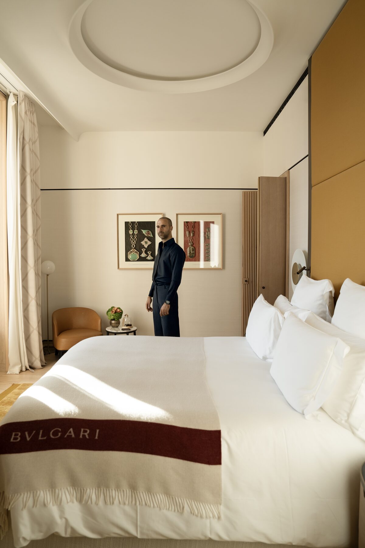 A suite at Bvlgari Hotels, morning light across pressed linen